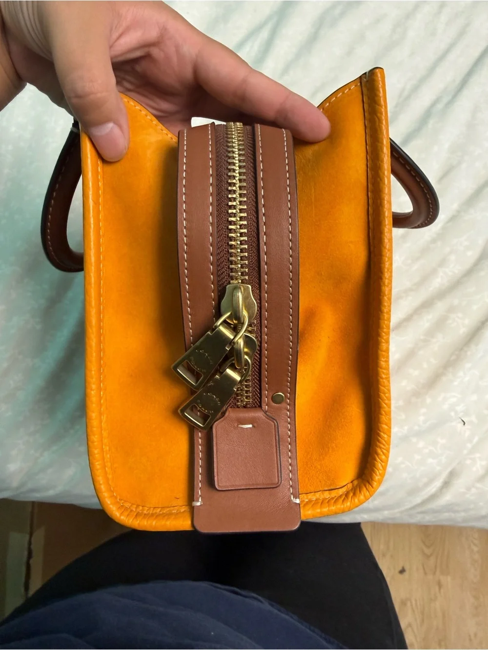 Coach Pebbled rouge 25 in papaya orange